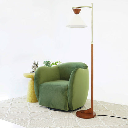 Green velvet swivel chair by HouseOfZazla, 360° rotation armchair in a bright living room on Tampa Home & Garden Store
