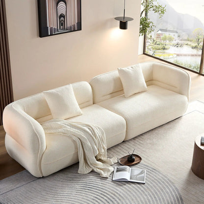 Sectional sofa durable cream boucle fabric with plush cushions in a contemporary living room on Tampa Home & Garden Store