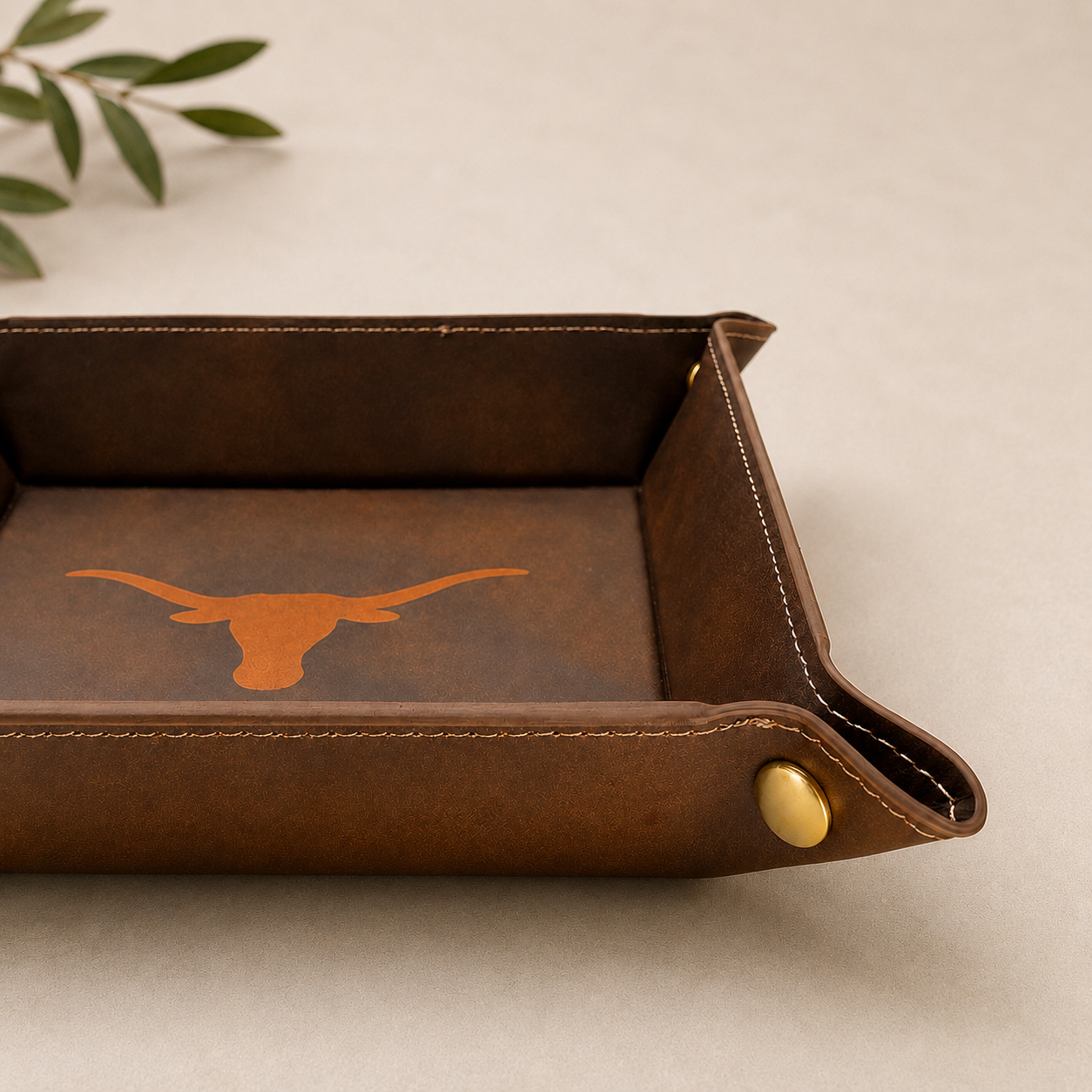 Texas Longhorn burnt orange leather catchall tray with visible longhorn silhouette on Tampa Home & Garden Store