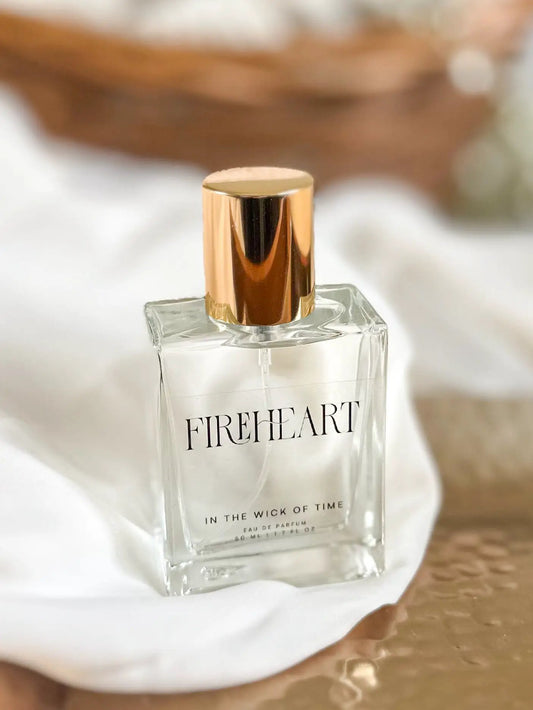 Fireheart Eau de Parfum bottle with clear glass and rose-gold cap by In the Wick of Time on Tampa Home & Garden Store