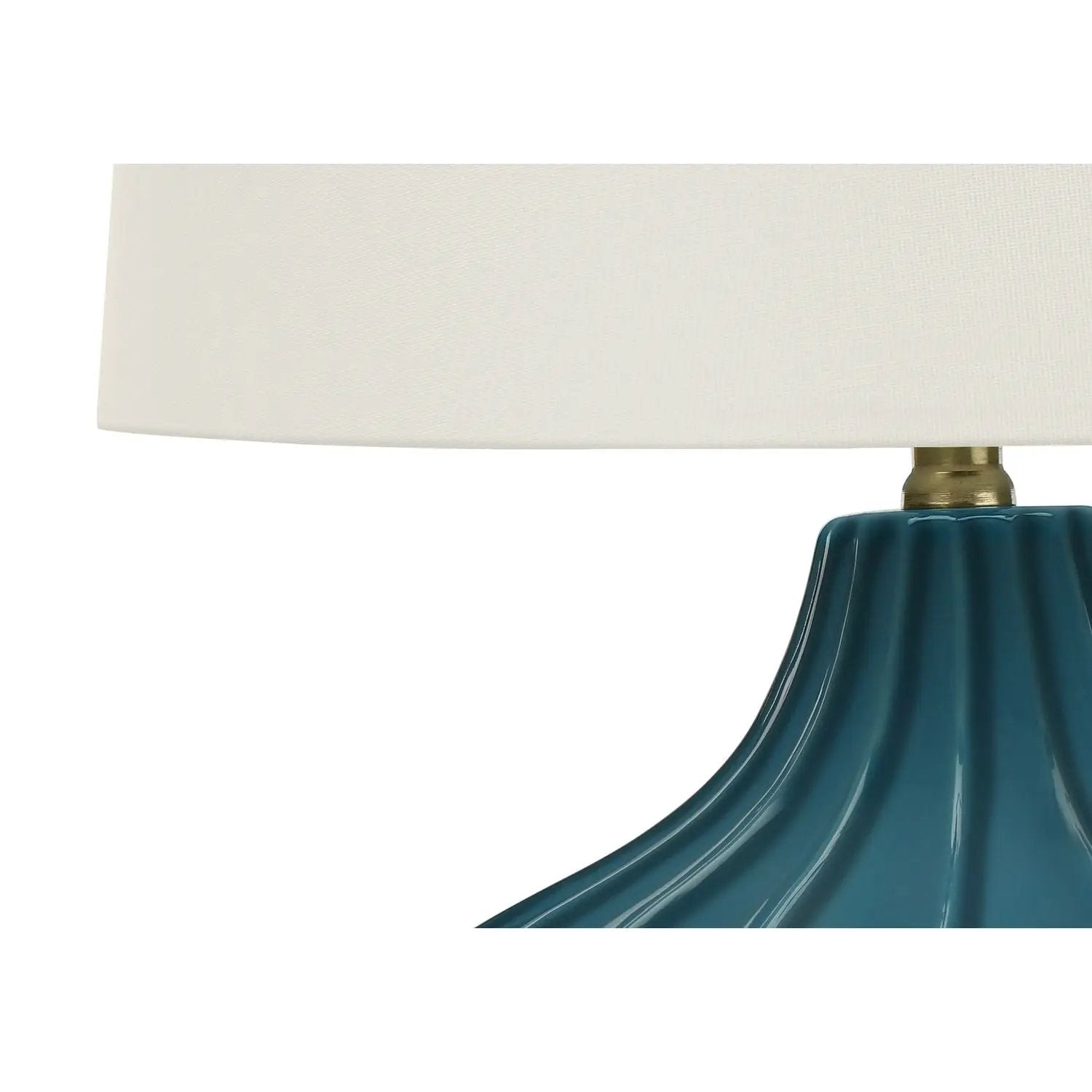 Table lamp ceramic blue ribbed base with brass neck and white fabric shade on Tampa Home & Garden Store