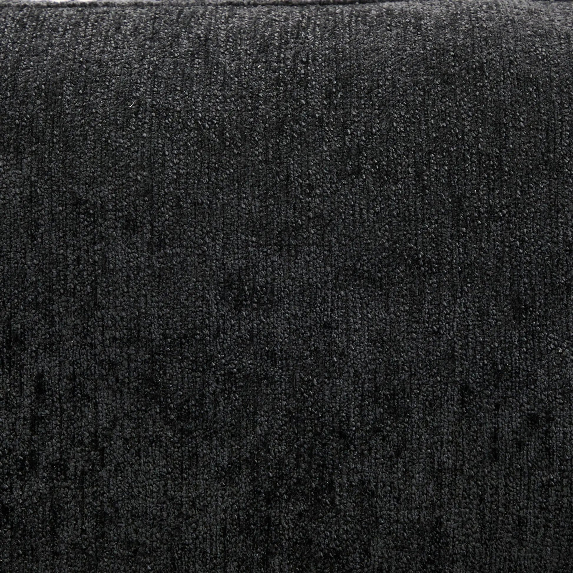 Dark charcoal loop-pile carpet texture close-up on Tampa Home & Garden Store