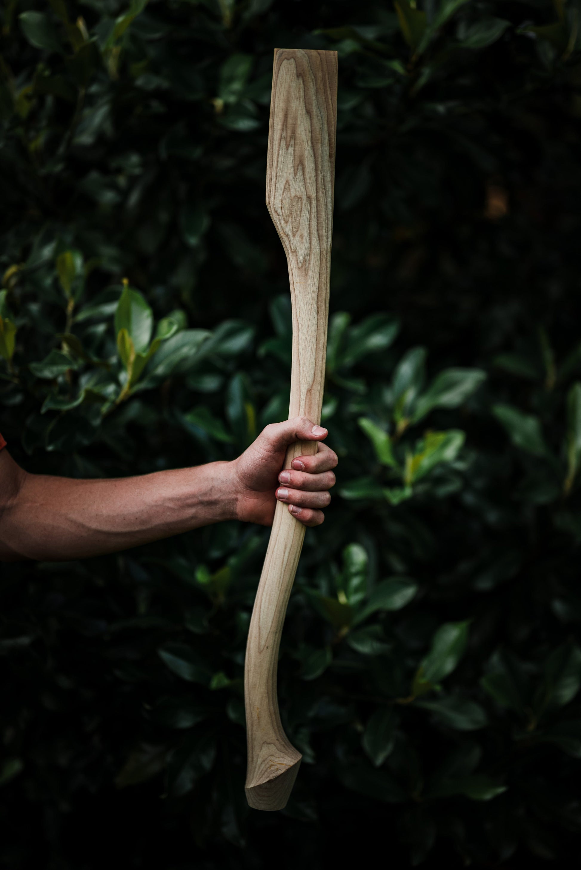 Whiskey River Premium Heritage 30C axe handle, 30-inch natural wood grain, held by hand on Tampa Home & Garden Store