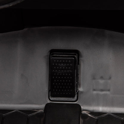 Side by side 4x4 ride-on off-road truck interior view with black textured pedal panel on Tampa Home & Garden Store