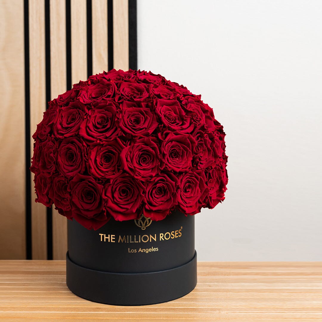 Classic Black Superdome Box filled with red roses by The Million Roses on Tampa Home & Garden Store
