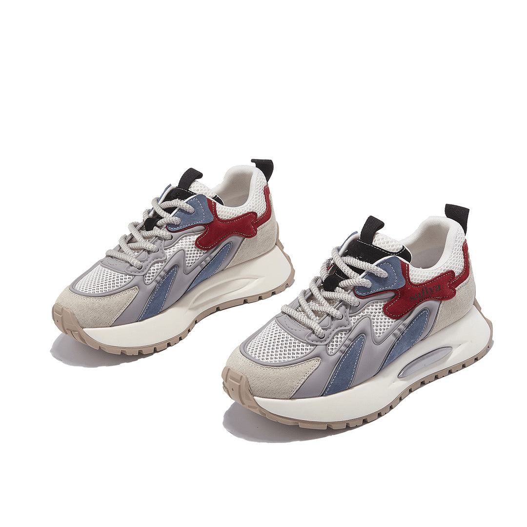 Pair of Stevvex luxury chunky sneakers with white mesh, grey overlays and red side accents on Tampa Home & Garden Store