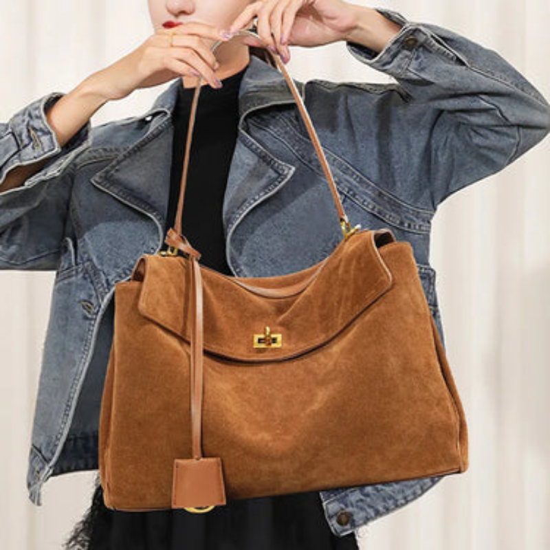 Large rectangular Moktan Sabai shoulder handbag in brown suede with gold hardware on Tampa Home & Garden Store