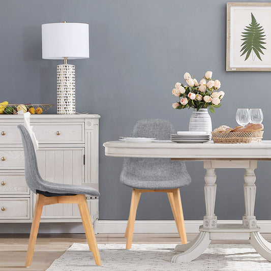 Juego de 4 sillas de comedor modernas con patas de madera y asiento acolchado de tela
