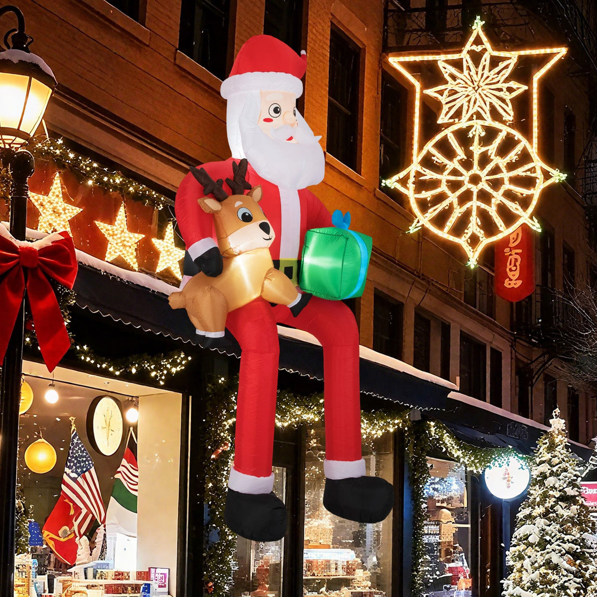 9.5 ft inflatable Santa by DirectDeals, LED-lit Santa with reindeer and green gift on storefront on Tampa Home & Garden Store