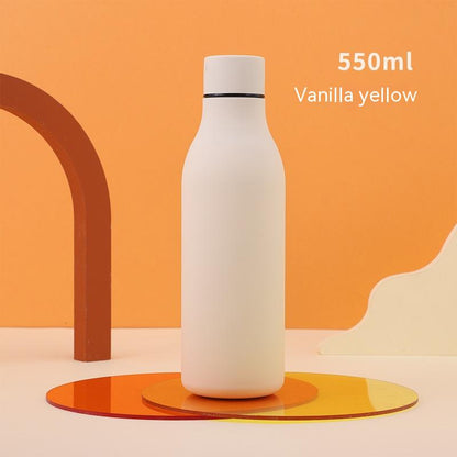 White stainless steel water bottle with screw cap, 550ml on orange-yellow studio backdrop on Tampa Home & Garden Store