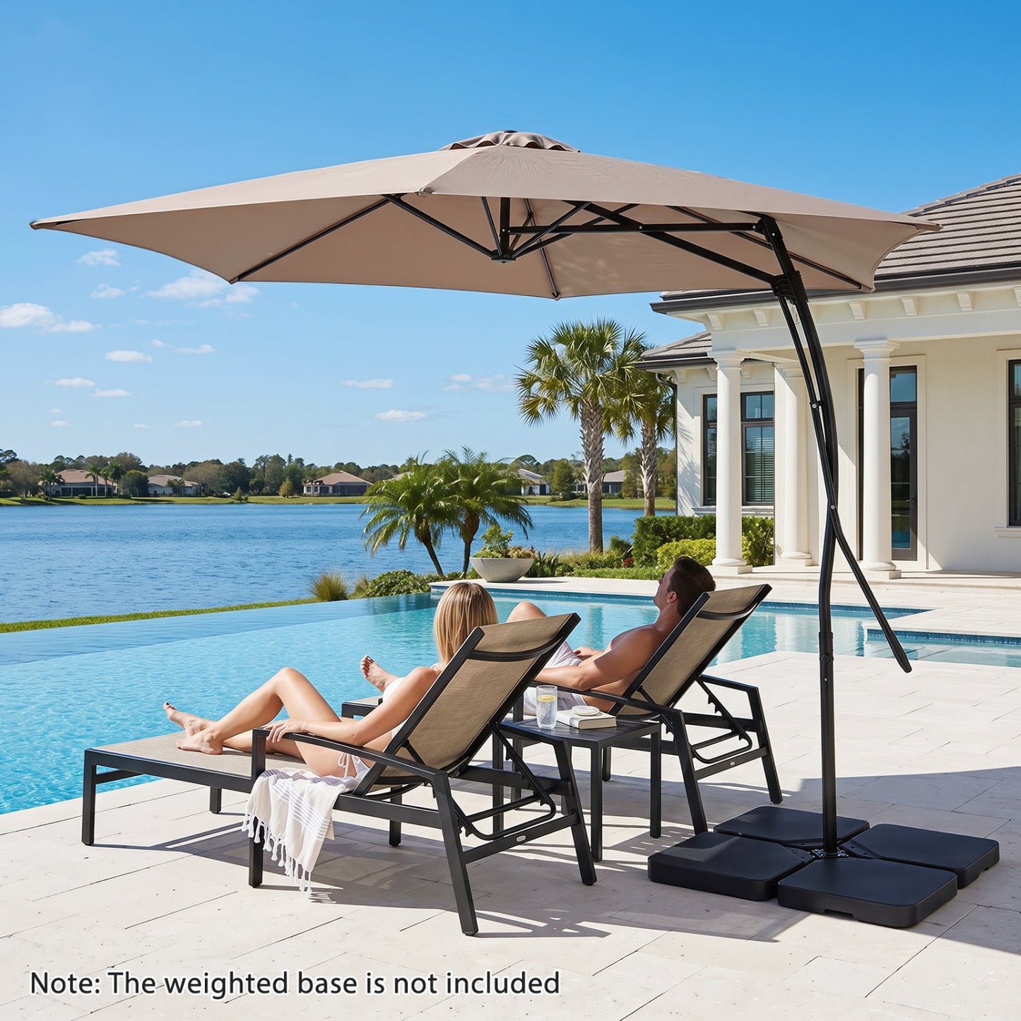 DirectDeals 9 ft cantilever umbrella tan canopy black frame crank handle over poolside loungers on Tampa Home & Garden Store