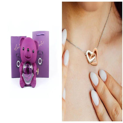 Purple teddy bear gift box with clear rotating rose orb and two-tone heart necklace on Tampa Home & Garden Store