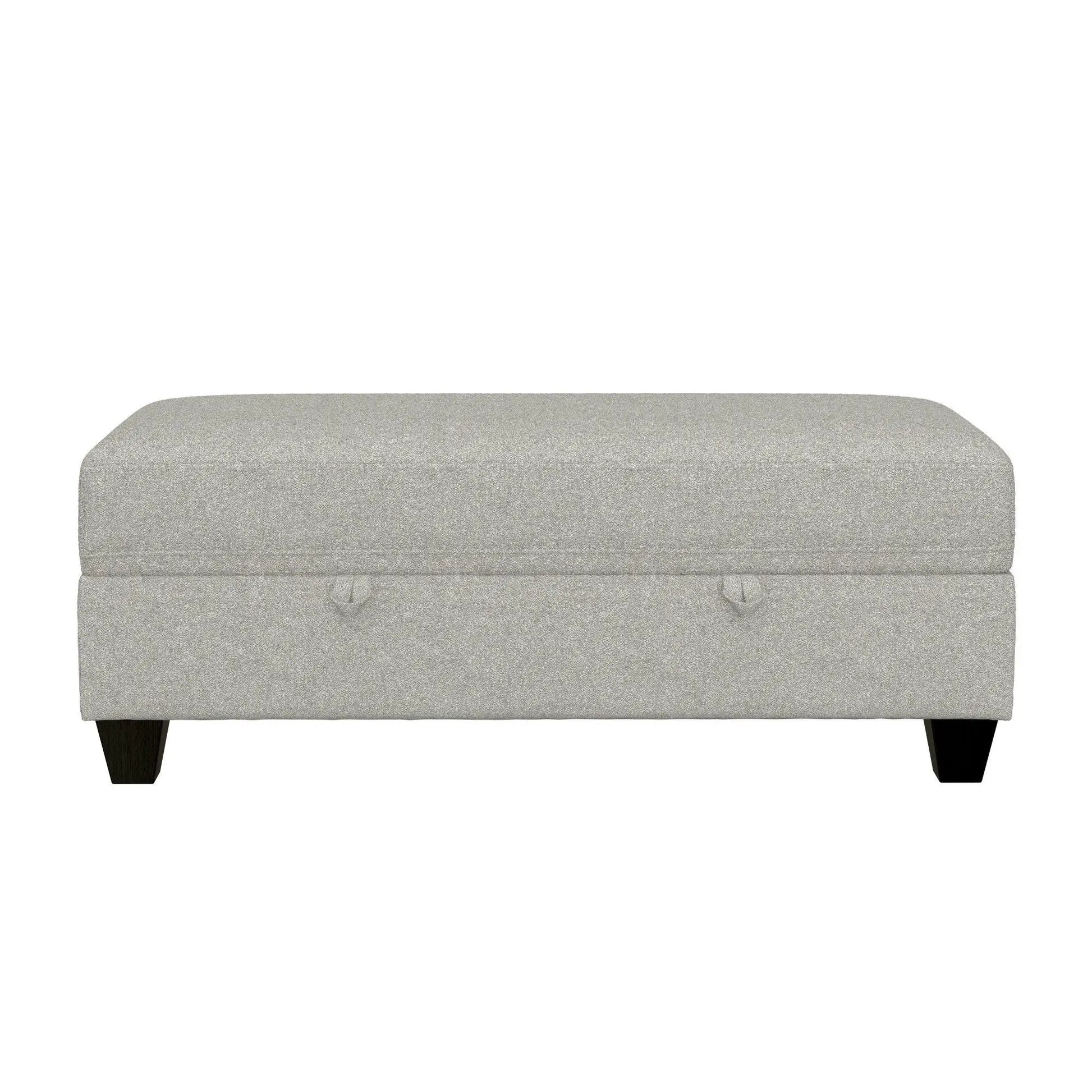 Drason storage ottoman in light gray textured fabric with rounded edges and dark legs on Tampa Home & Garden Store