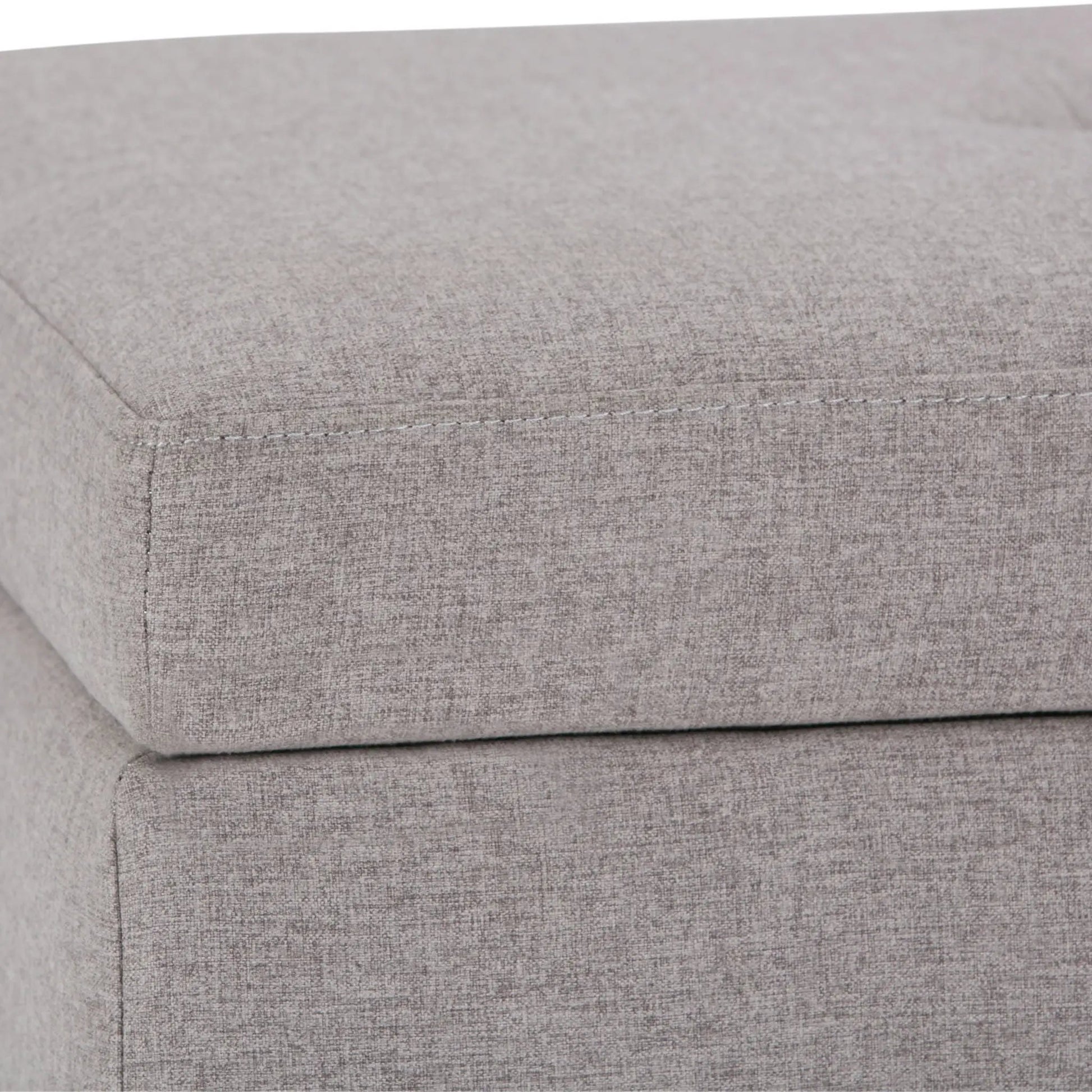Storage ottoman bench in light gray fabric with visible stitching by Unique Piece Furniture on Tampa Home & Garden Store