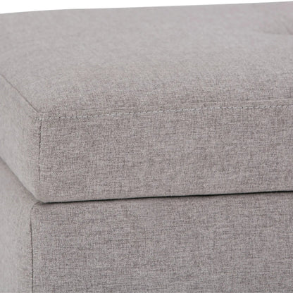 Storage ottoman bench in light gray fabric with visible stitching by Unique Piece Furniture on Tampa Home & Garden Store