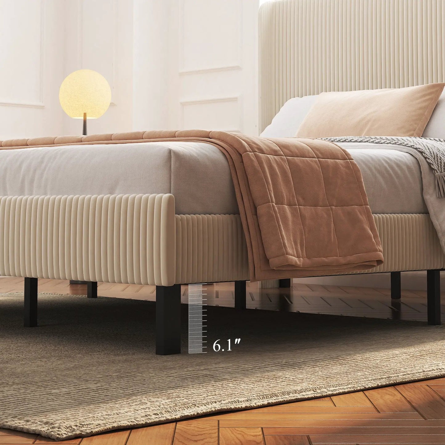Beige upholstered platform bed with ribbed headboard panels and black metal legs on Tampa Home & Garden Store