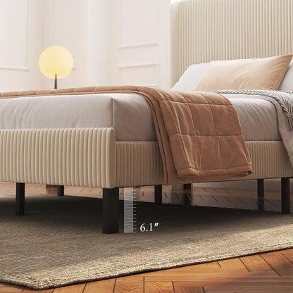Beige upholstered platform bed with ribbed headboard panels and black metal legs on Tampa Home & Garden Store