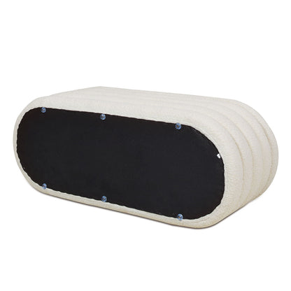 Fuji Upholstered Oval Storage Bench beige fabric with a black end panel and blue button accents on Tampa Home & Garden Store