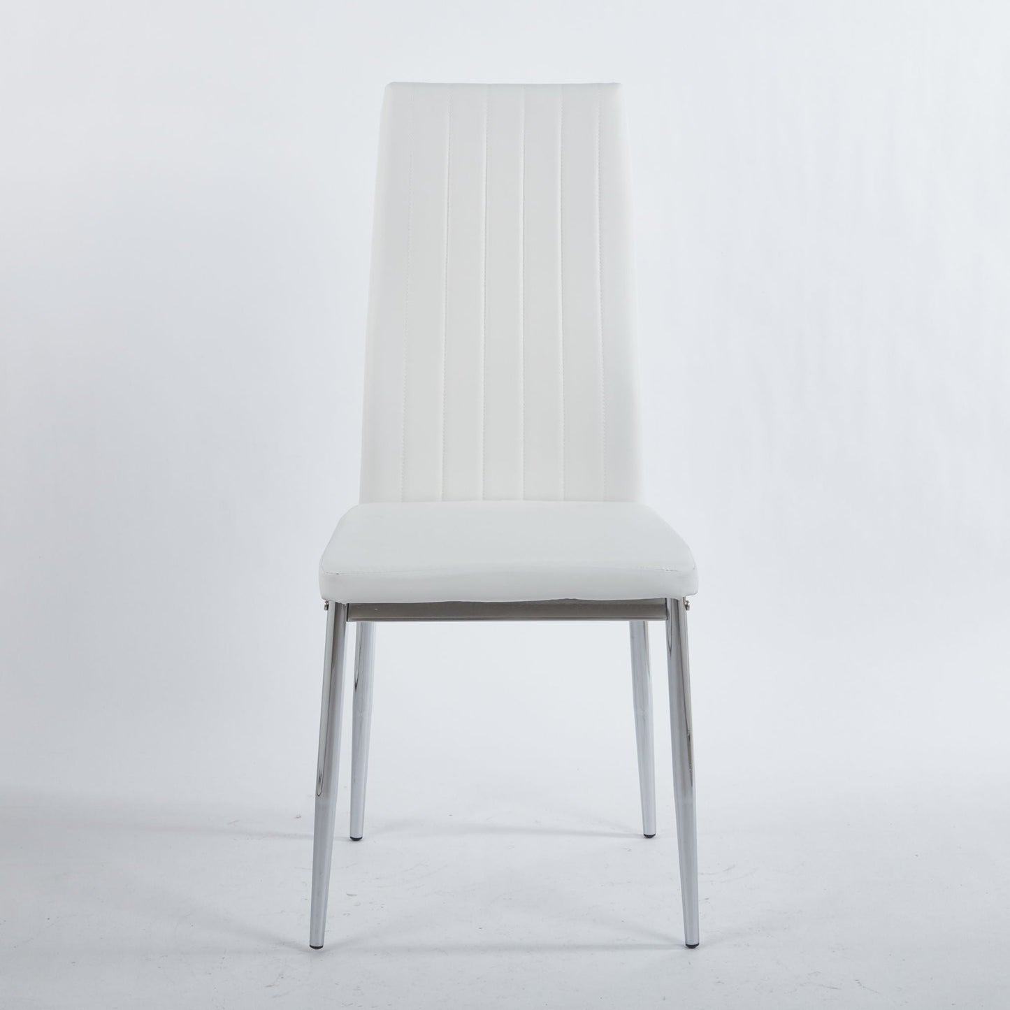 Minimalist white dining chair with chrome legs and vertical back stitching on Tampa Home & Garden Store