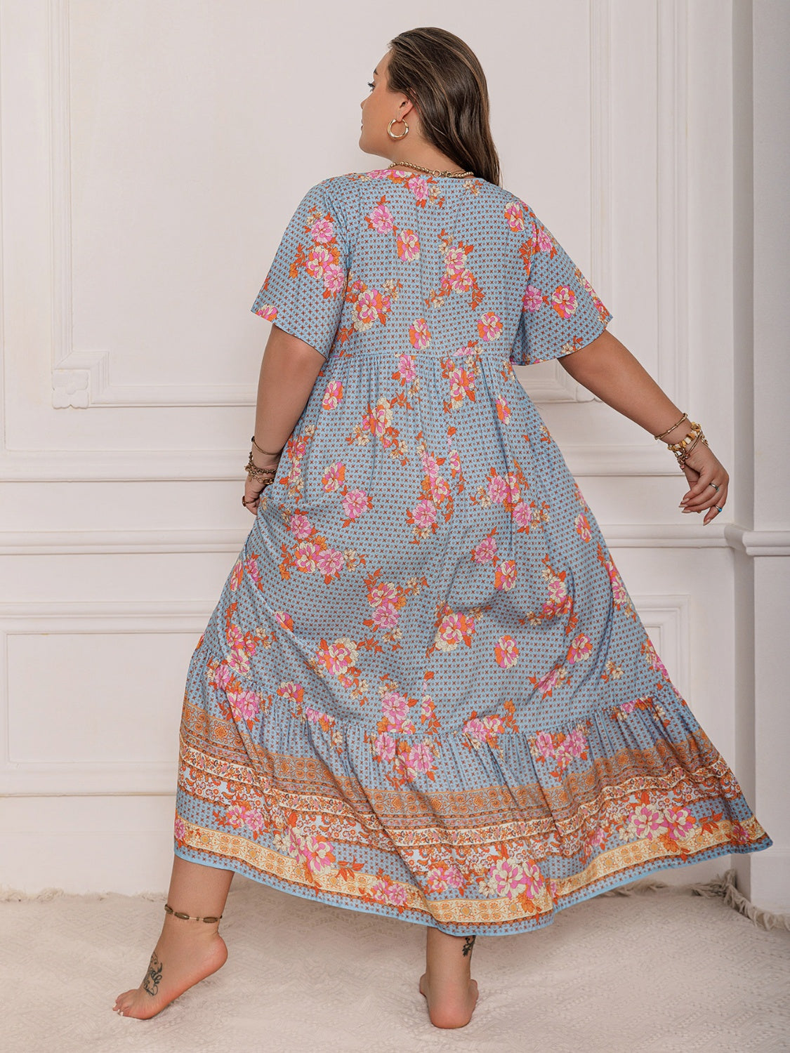 Stevvex plus-size flutter-sleeve maxi dress in blue with pink floral print and ornate border on Tampa Home & Garden Store