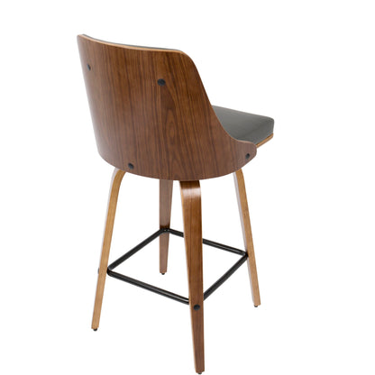 Mid-century walnut counter stool with black padded seat and curved back; swivel on Tampa Home & Garden Store