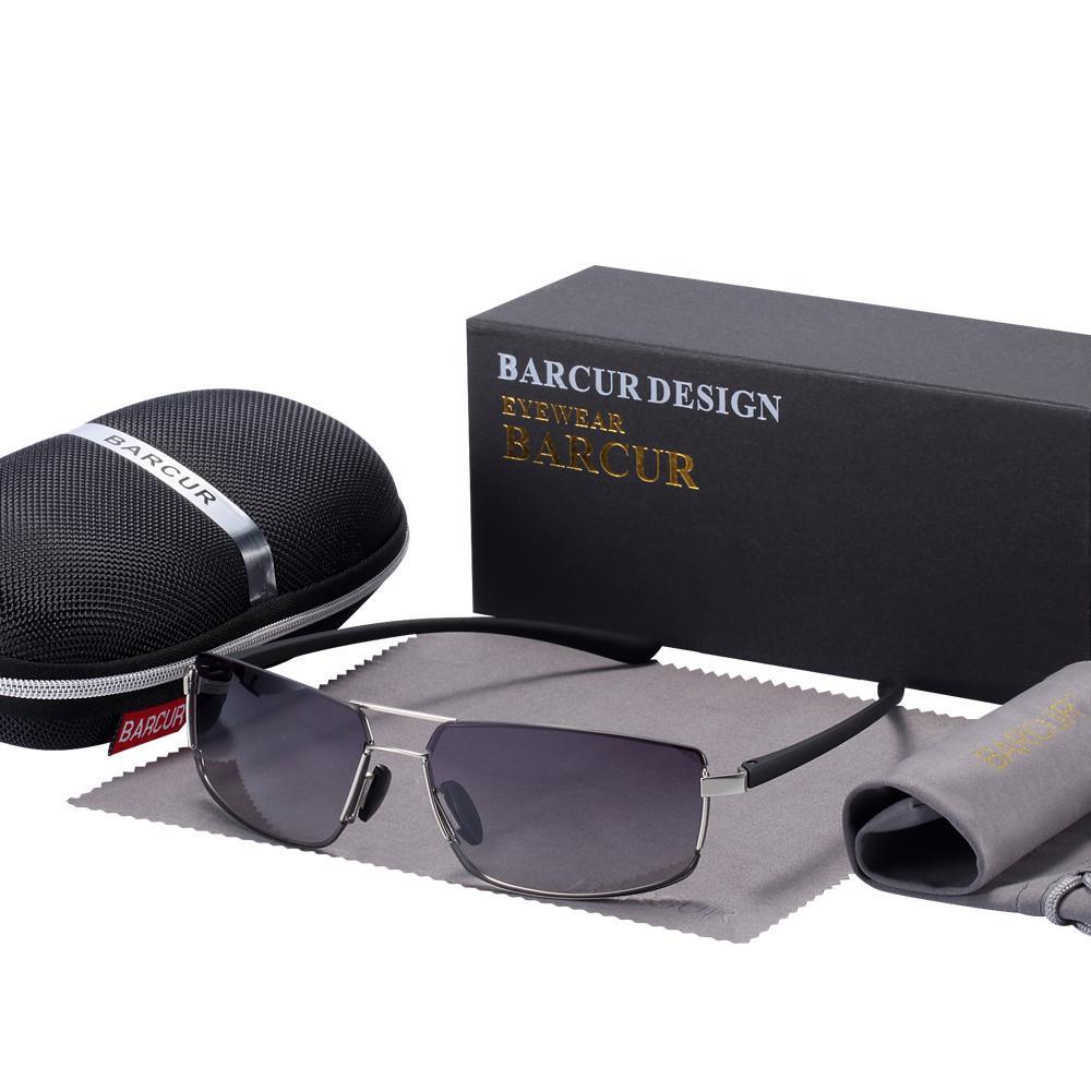 Barcur Design sunglasses with silver metal frame and dark gray lenses, case and box included on Tampa Home & Garden Store