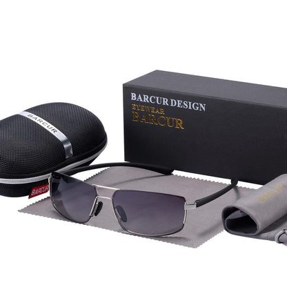 Barcur Design sunglasses with silver metal frame and dark gray lenses, case and box included on Tampa Home & Garden Store