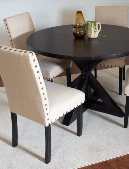 Mytzi 5 Piece Dining Set round black cross-buck table with four beige upholstered chairs on Tampa Home & Garden Store