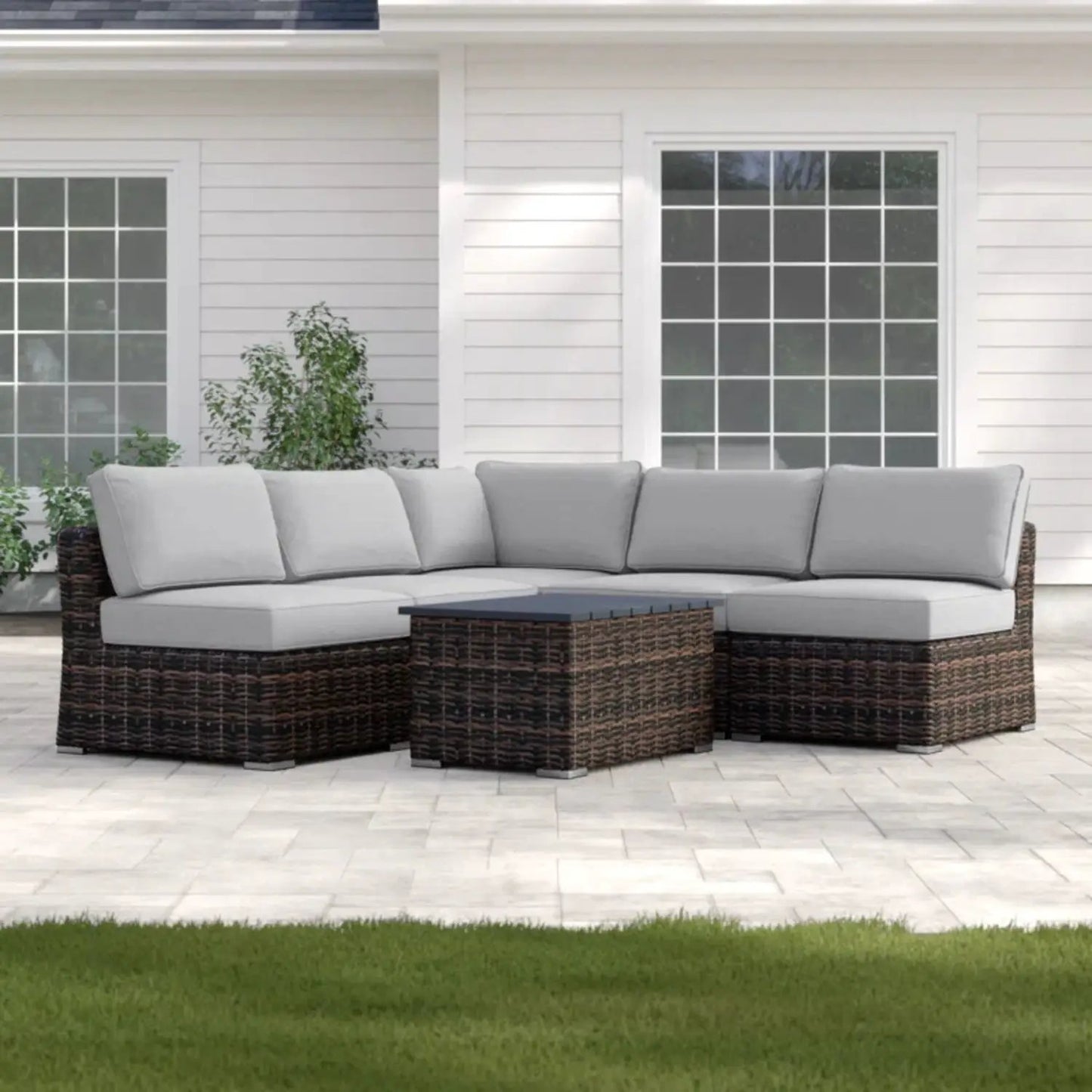 Wicker outdoor sectional sofa with light gray cushions and coffee table 2-piece set on Tampa Home & Garden Store
