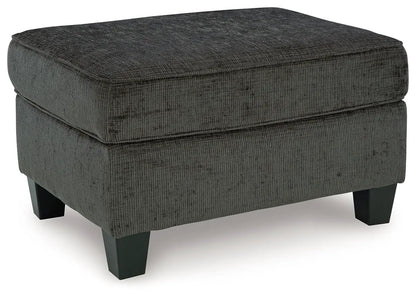 Erinslane ottoman by Unique Piece Furniture in dark gray corduroy fabric with square black legs on Tampa Home & Garden Store