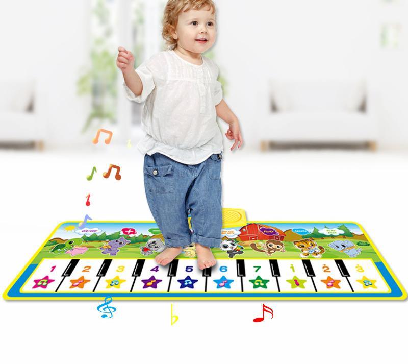 Stevvex Animals Musical Mat Carpet with 10 Keys, toddler standing on colorful piano mat on Tampa Home & Garden Store