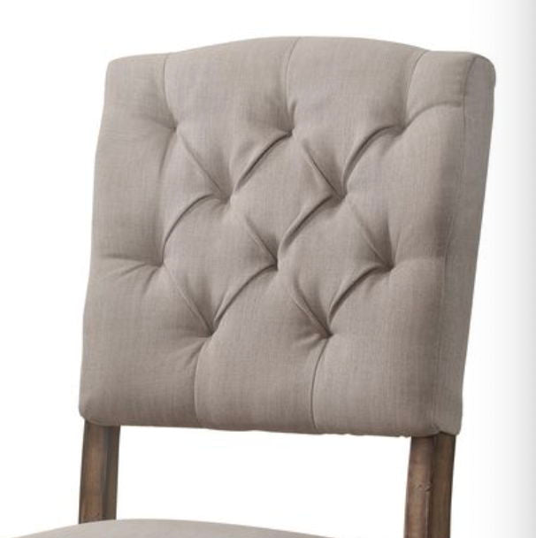 Weathered Side Chair with button tufting in beige upholstery by HouseOfZazla set on Tampa Home & Garden Store