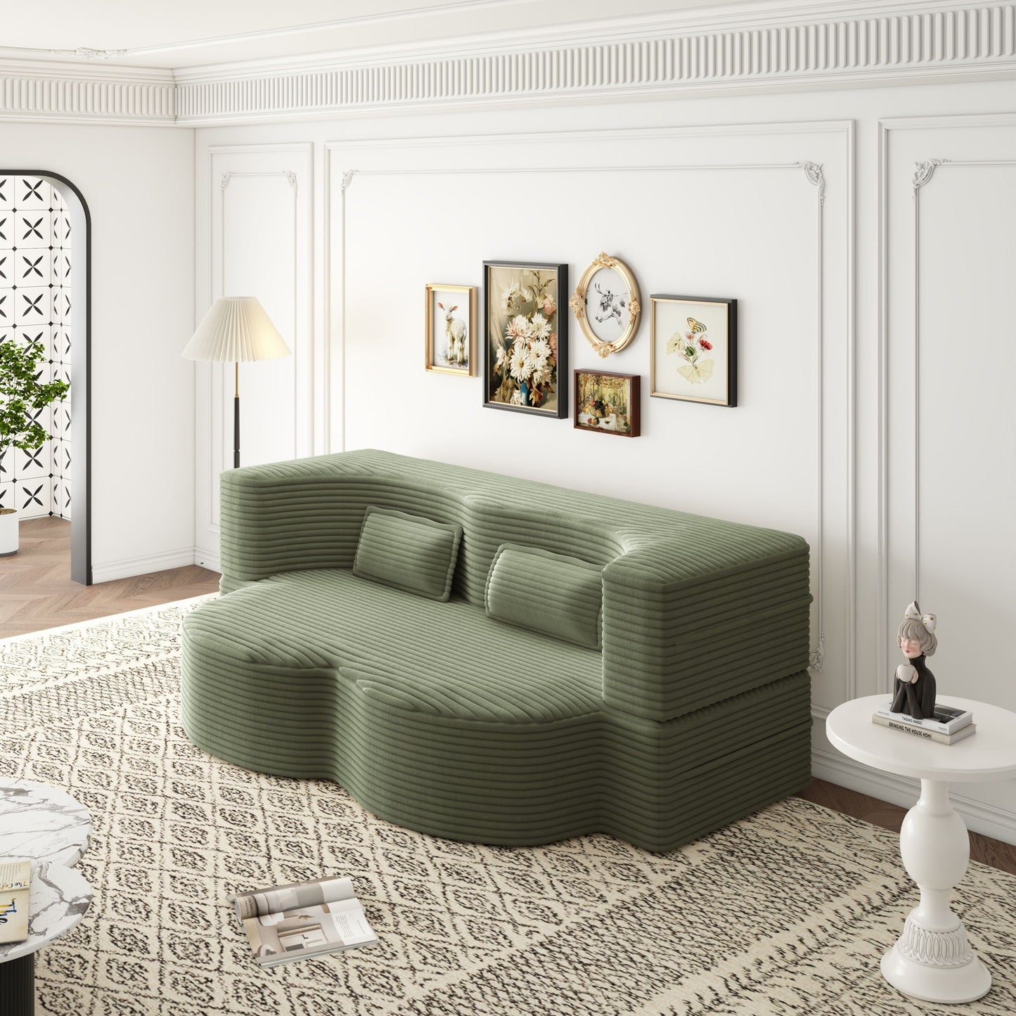 Convertible foam-filled sleeper sofa bed with 2 pillows in sage green ribbed upholstery on Tampa Home & Garden Store
