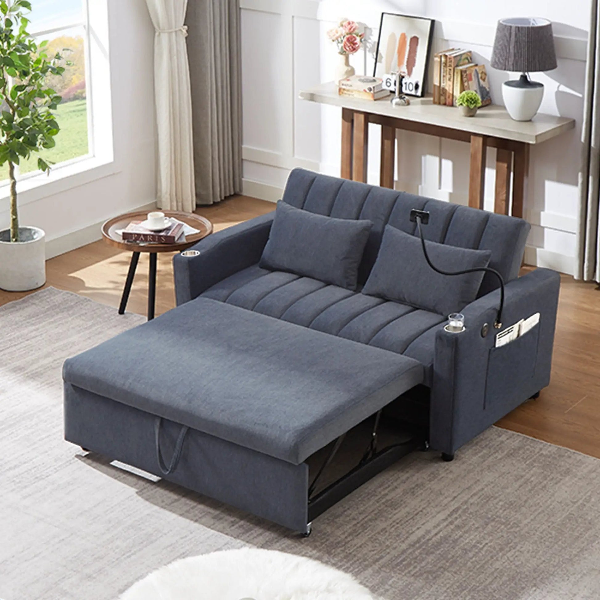 Convertible sofa bed loveseat in blue fabric in a contemporary living room on Tampa Home & Garden Store