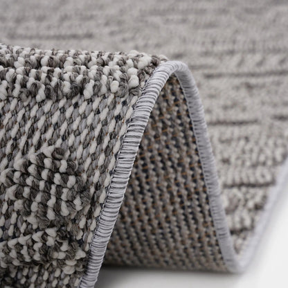 Guros indoor/outdoor rug in grey looped yarn with braided edge by Unique Piece Furniture on Tampa Home & Garden Store