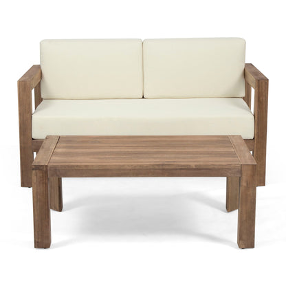 2 Piece Patio Set with open-back loveseat and coffee table, beige cushions, wood frame on Tampa Home & Garden Store