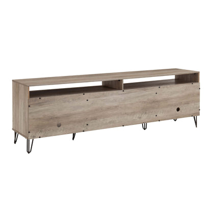 Fluted TV stand with storage and metal legs in weathered wood finish on Tampa Home & Garden Store