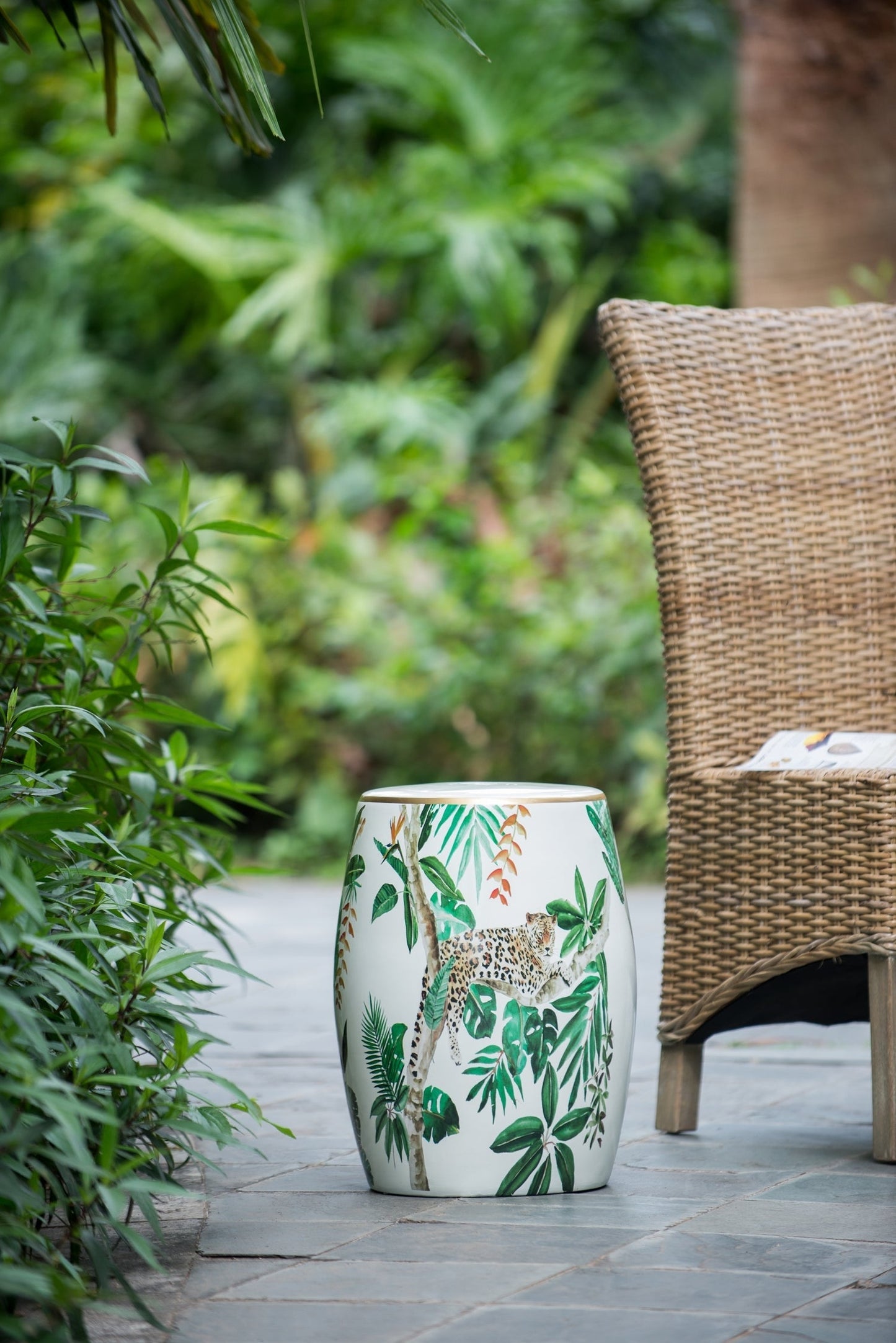 Ceramic jungle-themed garden stool 13x13x18 with tropical leaves pattern on Tampa Home & Garden Store