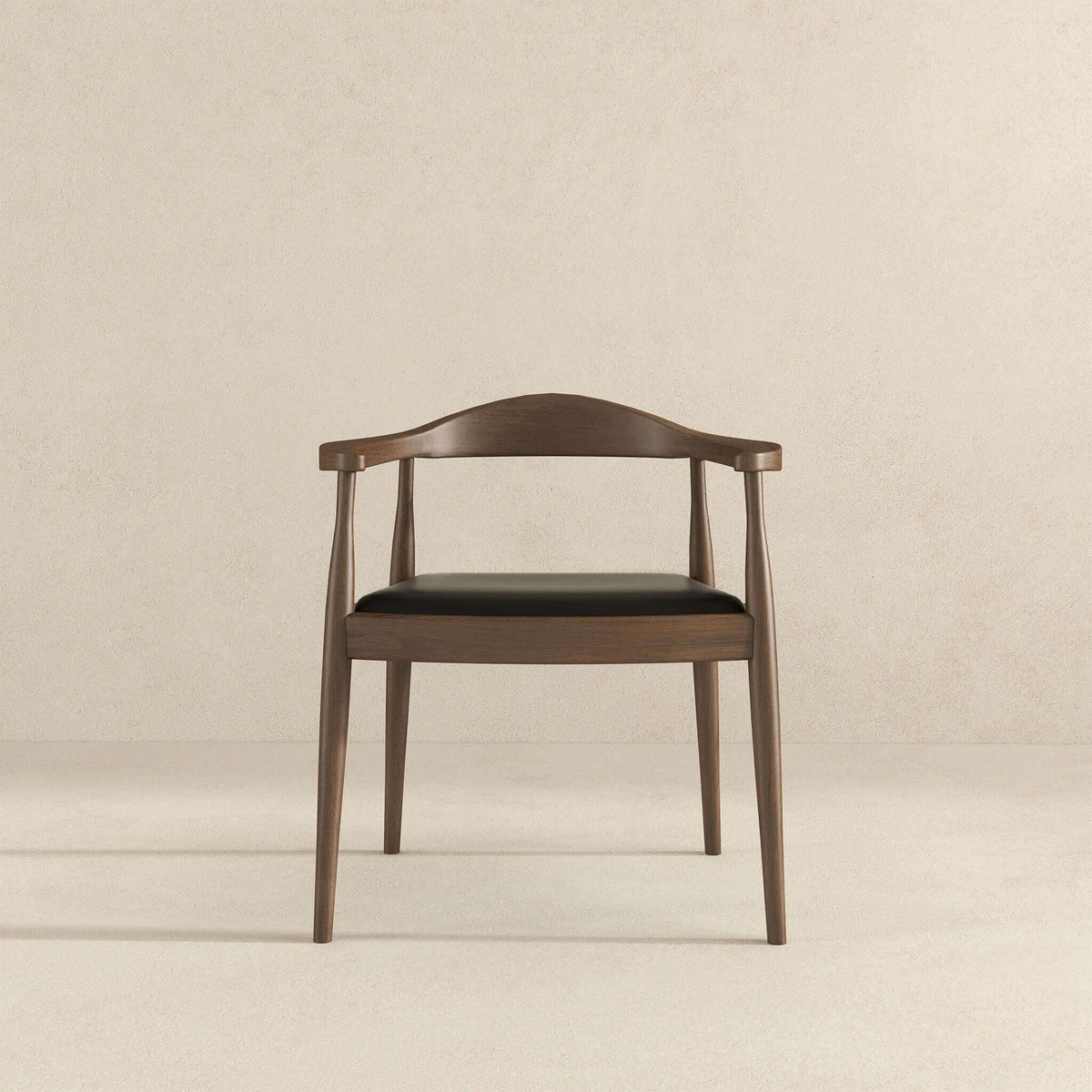 Mid-Century Modern Arm Chair by HouseOfZazla with dark brown wood frame and black cushion on Tampa Home & Garden Store