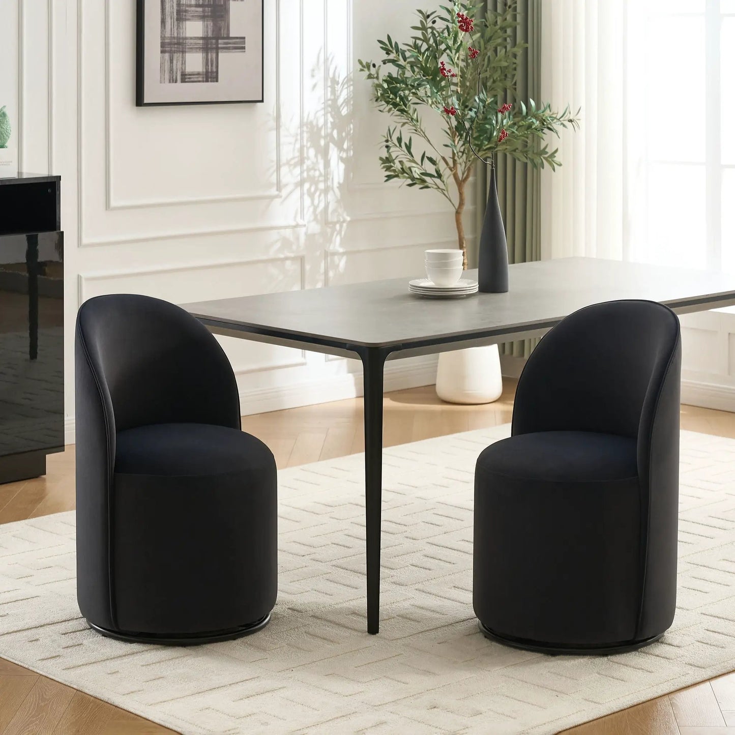 360 Degree Swivel Armless Dining Barrel Chairs in black faux leather, two around a gray table on Tampa Home & Garden Store