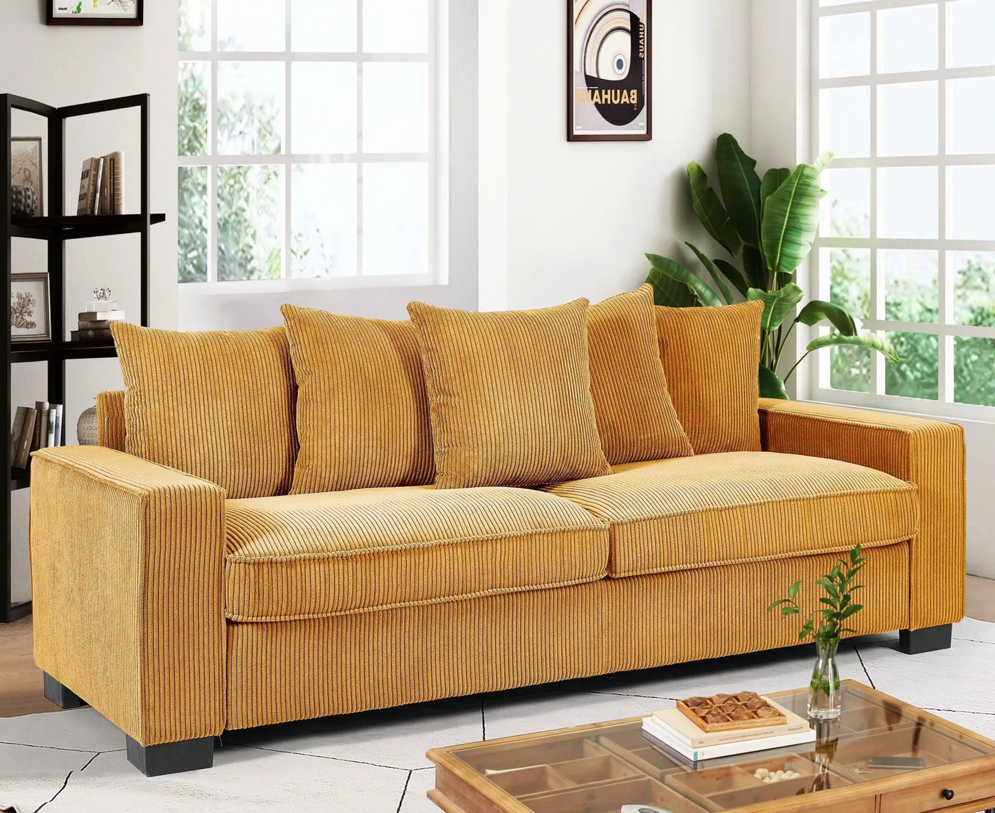 Luxe sofa with 5 matching mustard corduroy toss pillows, 3-seater in bright living room on Tampa Home & Garden Store