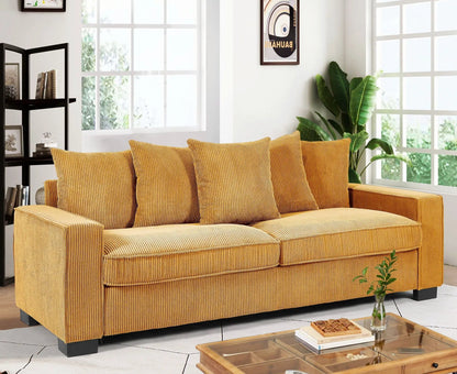Luxe sofa with 5 matching mustard corduroy toss pillows, 3-seater in bright living room on Tampa Home & Garden Store