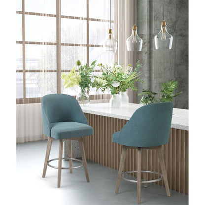 Bar stools with swivel seats; light blue upholstery; counter height 24–27; wood legs on Tampa Home & Garden Store