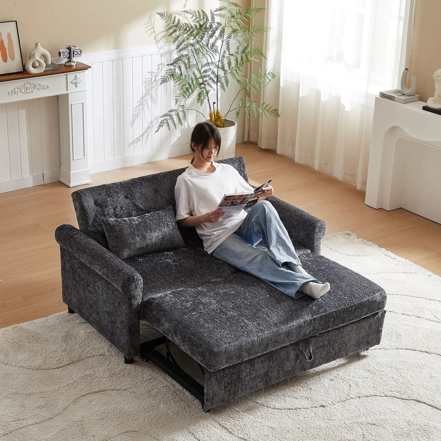 Sleeper loveseat dark gray textured fabric with pull-out bed by Unique Piece Furniture in a bright living room on Tampa Home & Garden Store