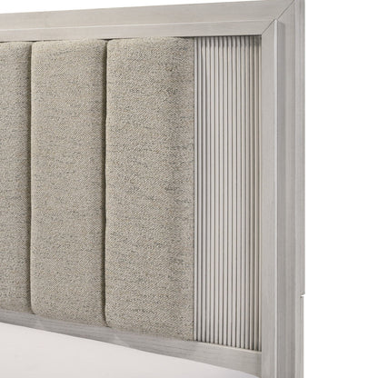 Plush upholstered headboard with fabric panels in a light gray wood frame and vertical ribbing on Tampa Home & Garden Store