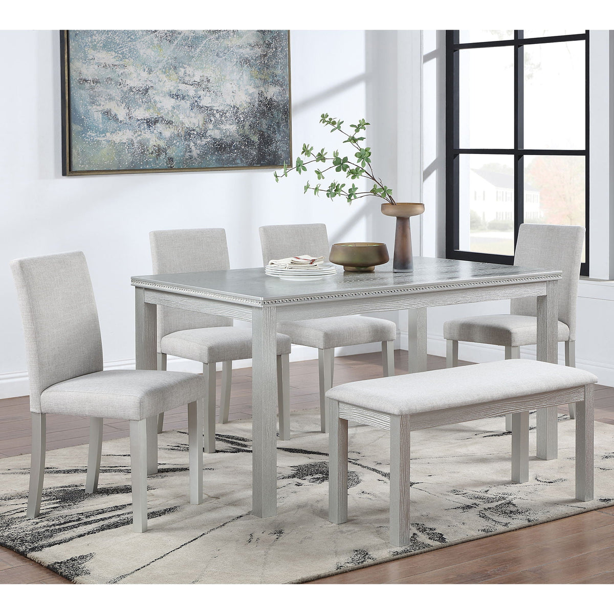 5-piece dining table set with upholstered light gray chairs and a gray-washed wood table on Tampa Home & Garden Store