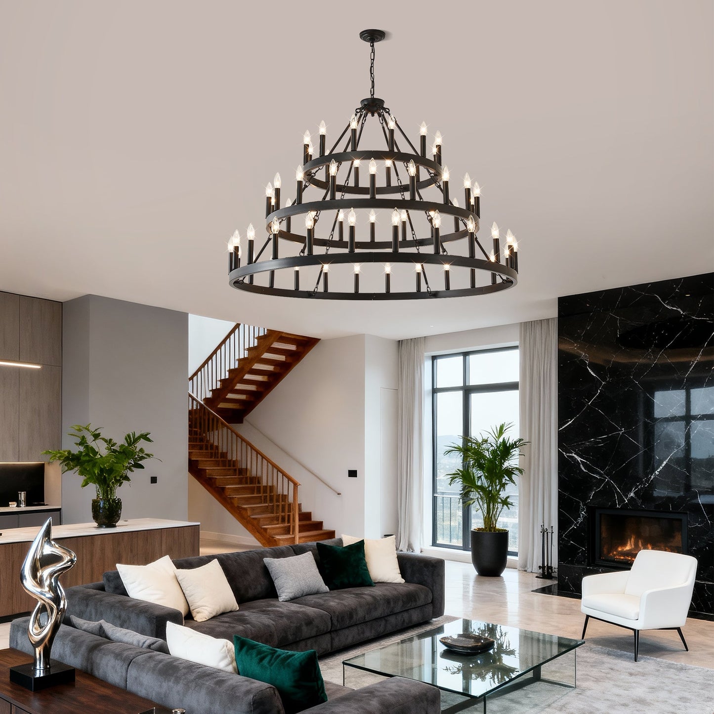 3-Tier Wagon Wheel Chandelier, 54-light matte black metal, chain-hung in modern living room on Tampa Home & Garden Store