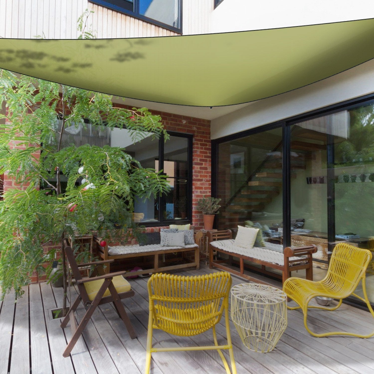 Shade sail GemGear olive green triangle patio canopy over wooden deck with outdoor seating on Tampa Home & Garden Store