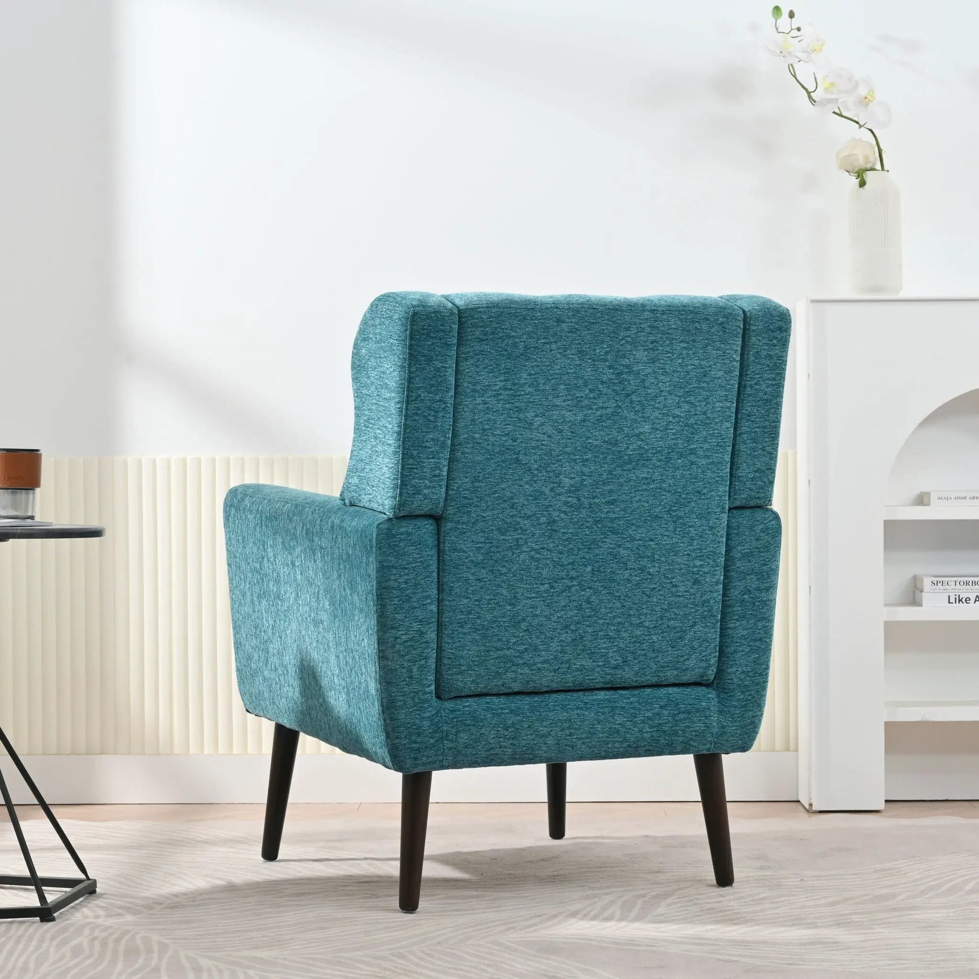 Accent chair teal fabric with foam-filled cushions, mid-century modern style on Tampa Home & Garden Store