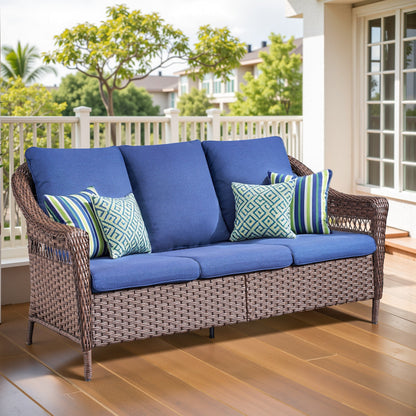 67.3-inch outdoor wicker patio sofa with cobalt blue cushions and geometric pillows by HouseOfZazla on Tampa Home & Garden Store